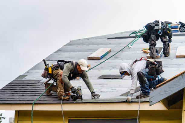 Professional Roofing technician working in East Livermore, ME